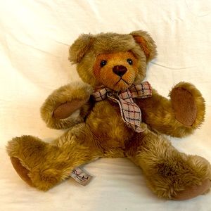 Vintage bear made by Rich he’s big and fluffy, Great for child to hug and hold.